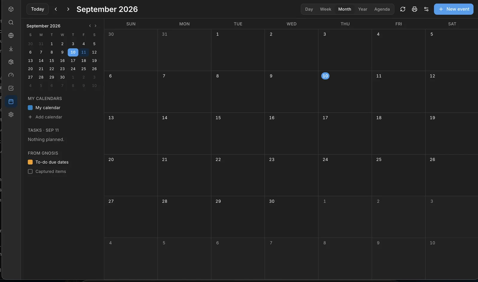 The Gnosis calendar in month view, with task due dates and captured items listed beside a personal calendar.